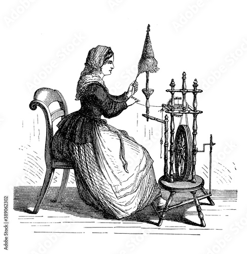 Vintage illustration of a young woman working at the spinning wheel, pulling and twisting a clump of textile fibers into a string yarn on a spindle photo