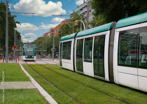 View of the Barcelona tram on Calle Marina. The tram is the most preferred urban transport to the Catalans.	 photo
