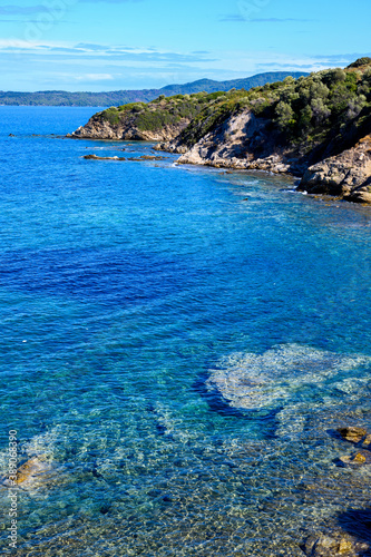 Blue shores and immaculate sea water near mountains in Nea Roda