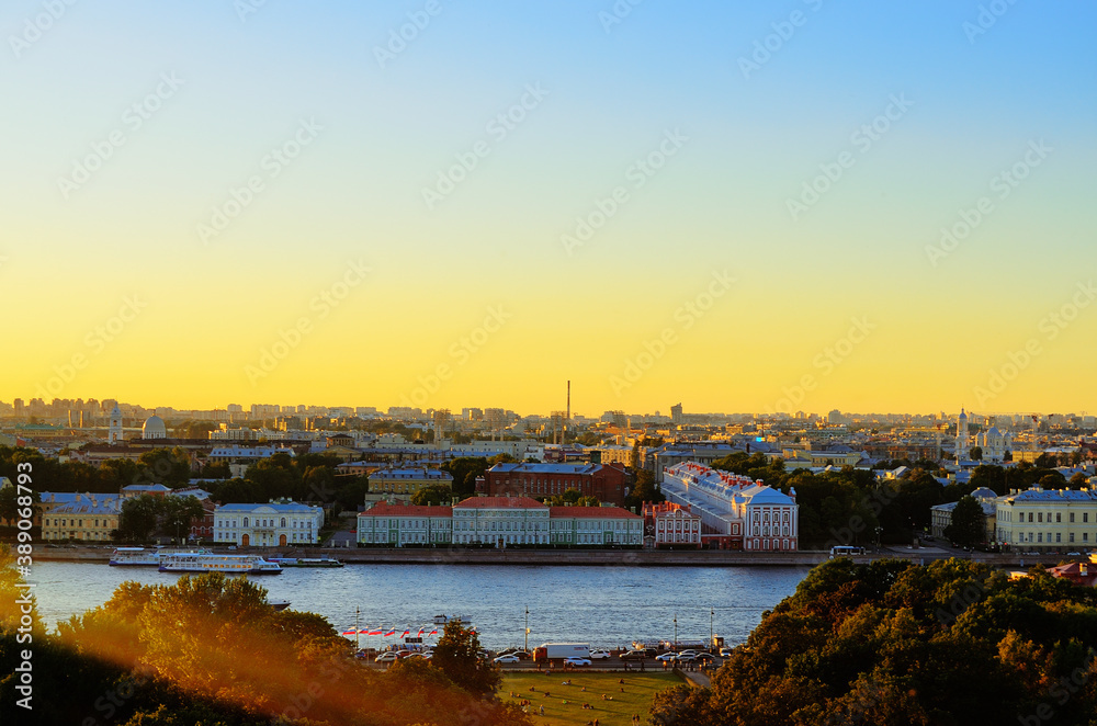 City landscape in the rays of the setting sun. Russia Saint Petersburg 08/17/2020
