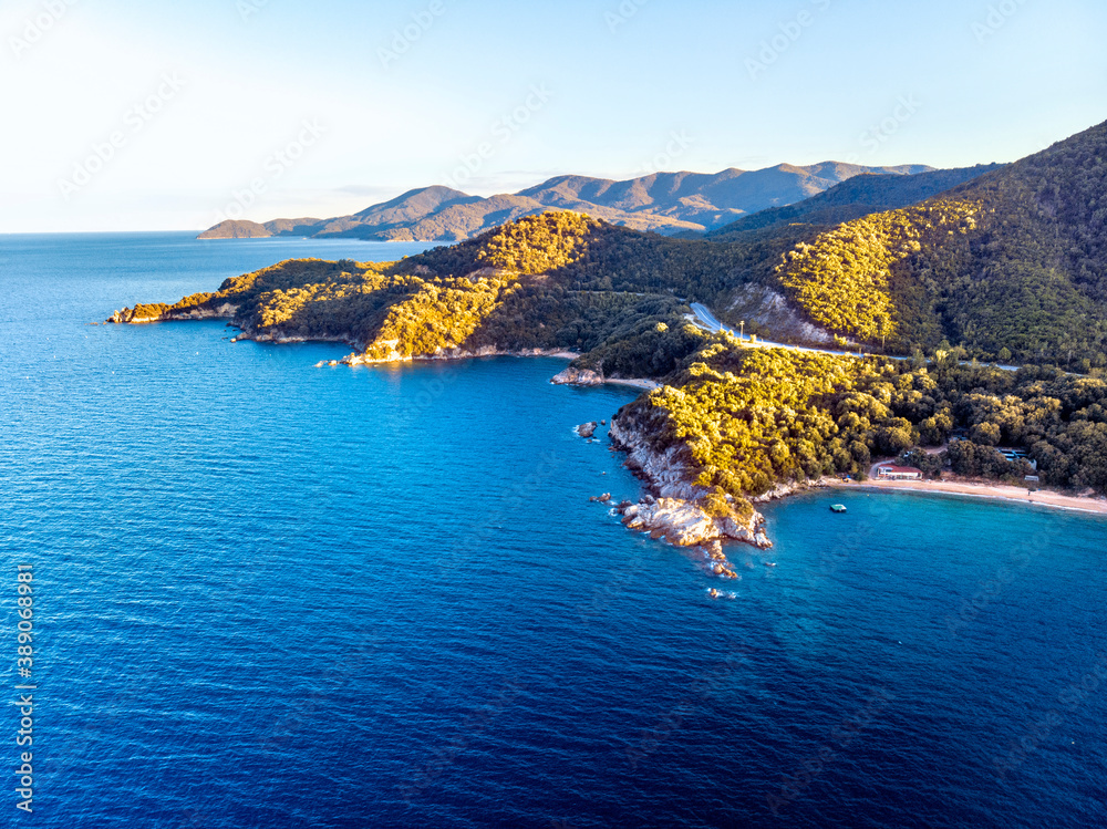 Fototapeta premium Drone panorama of sunset in Halkidiki with blue sea and mountains