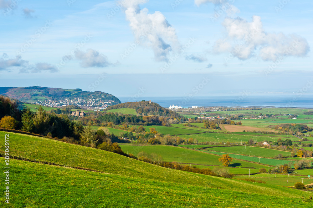 Dunster Castle and Minehead from Withycombe Hill, Dunster, Somerset