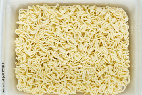 instant noodles in rectangle plastic plate, top view