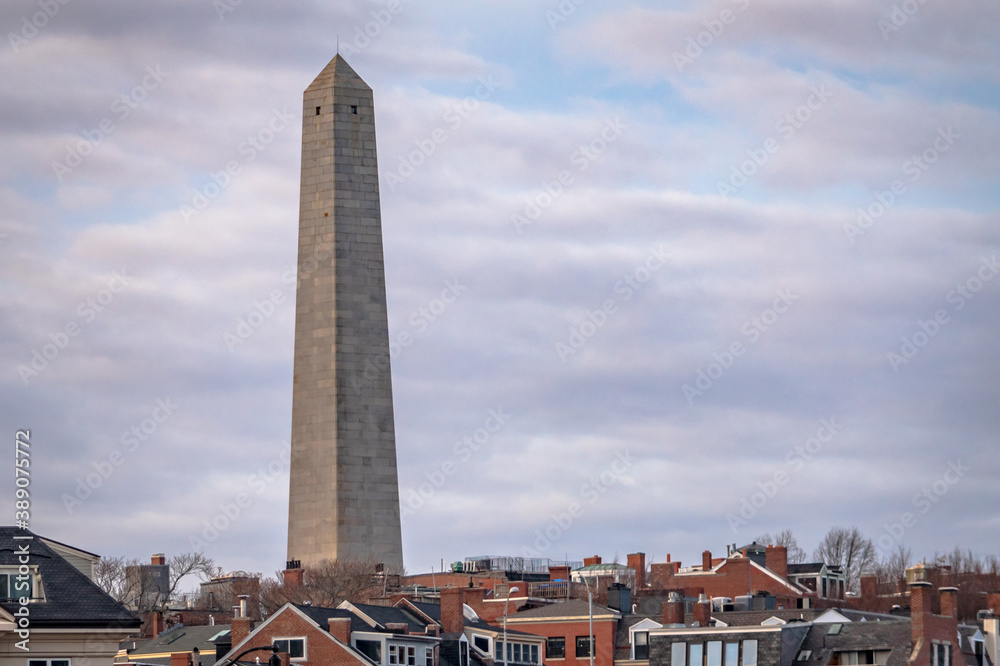 The Bunker Hill Monument rises above Charlestown, MA