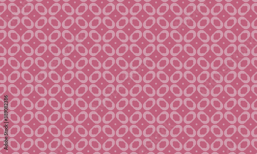 pattern of small oval elements with dots in pink tones.