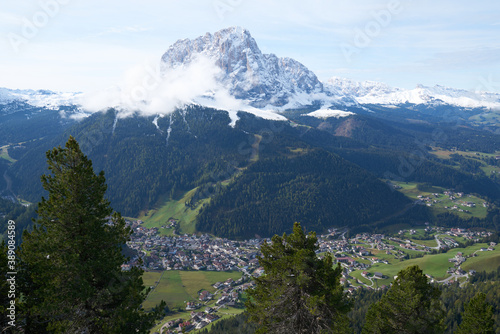 Hiking and trekking in the beautiful Mountains of Dolomites, wolkenstein in the valley under langkofel mountain © Fizzl