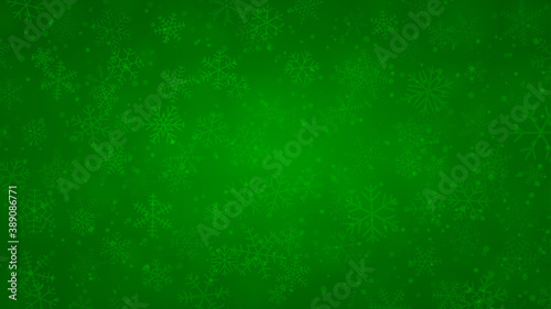 Christmas background of snowflakes of different shapes, sizes and transparency in green colors