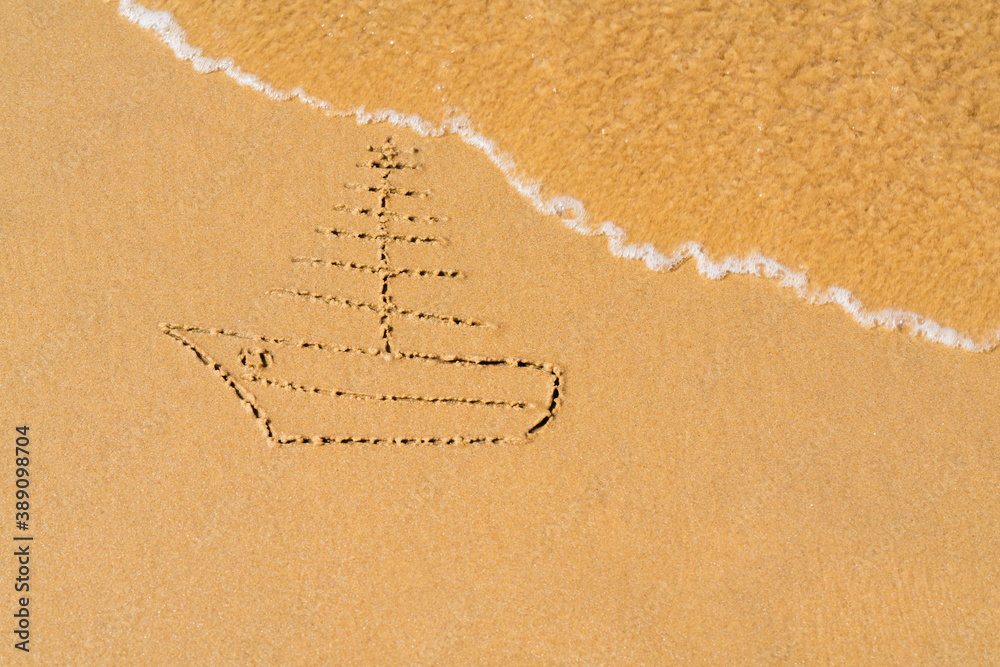 Fototapeta premium Painted sailboat on the sea sand