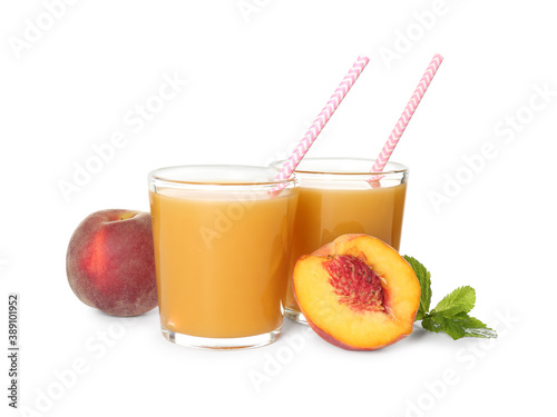 Natural freshly made peach juice on white background