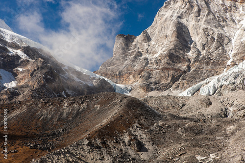 Mountain landscape in Pachermo base camp. Himalayas. Nepal. Rocky mountains, blue sky and glacier on the way to Tashi Lapcha pass and Pachermo summit. photo