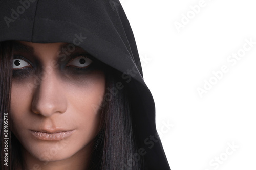 Mysterious witch with spooky eyes on white background, closeup © New Africa