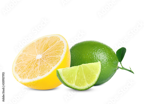 Fresh ripe limes and lemon on white background