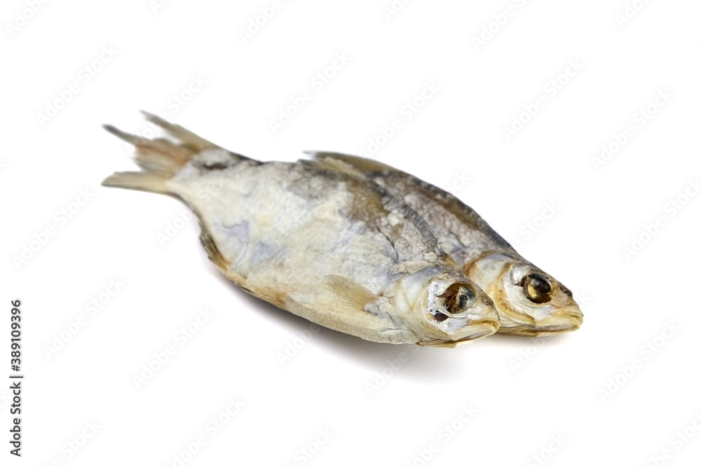 Two dry fish isolated on white background. Two dry fish isolated on white background.