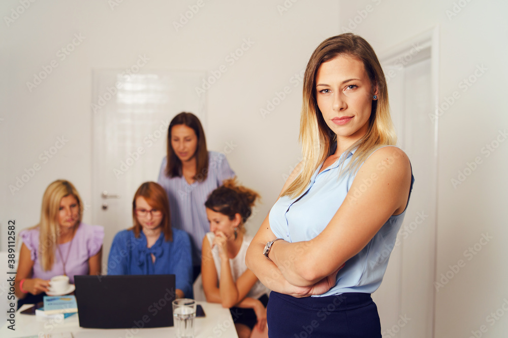 Obraz premium Caucasian woman boss entrepreneur with businesswomen colleagues working on the project brainstorming developing new concept - Females only gender equality leadership and support
