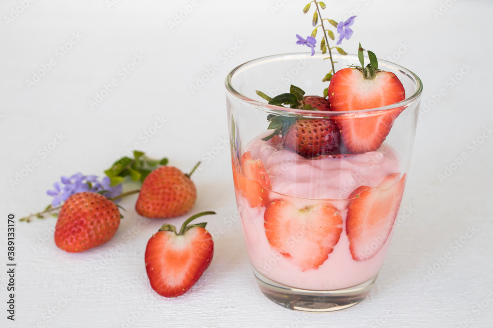 healthy foods yogurt from fruits strawberry for diet weight with purple flower decoration flat lay style on background white healthy foods yogurt from fruits strawberry for diet weight with purple flower decoration flat lay style on background white