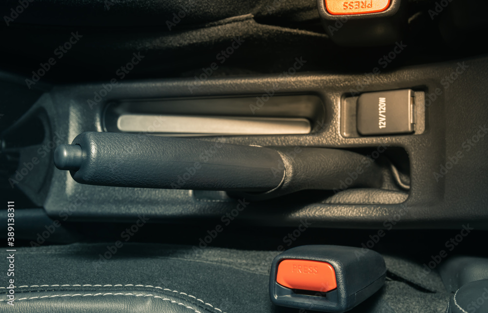 Fototapeta premium Gray Hand Brake and Seatbelt Lock Inside Car in Vintage Tone