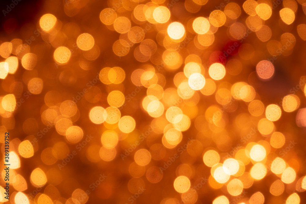Christmas and new year lights. Blurred lights of orange color. Can be used as background and texture Christmas and new year lights. Blurred lights of orange color. Can be used as background and texture