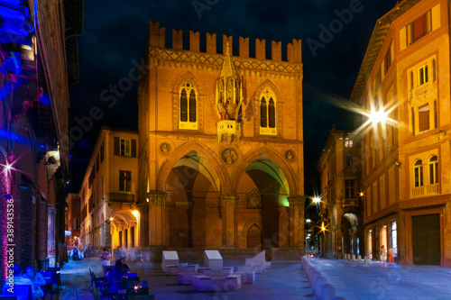 View by night of the Palazzo della Mercanzia in Piazza della Mercanzia square, Bologna Italy