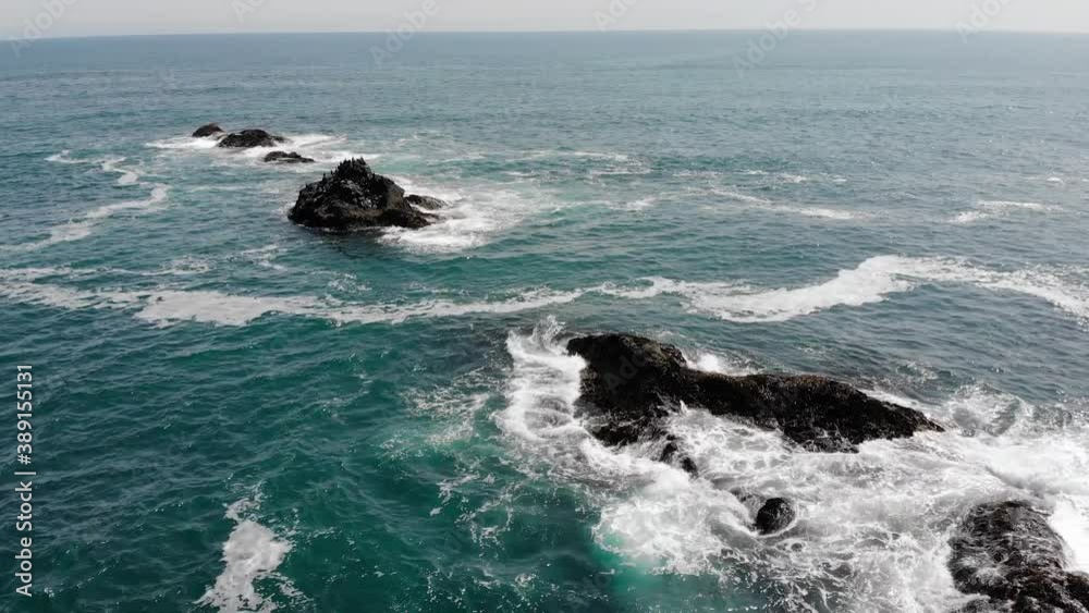 Aerial view of ocean waves and fantastic Rocky coast Aerial view of ocean waves and fantastic Rocky coast