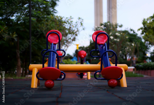 View playground in garden park colorful playground for children	