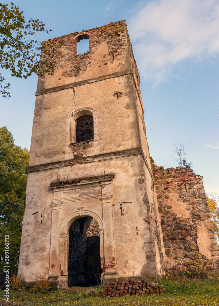 landscape with old church ruins, ruins overgrown with bushes and grass, autumn time, Ergeme Evangelical Lutheran Church was one of the most beautiful churches in Latvia
