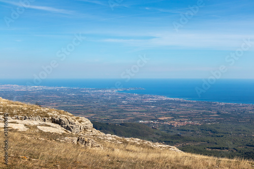 Cape of Salou and the surrounding pictured from above, touristic area in summer time by the Mediterranean sea. Tarragona, Catalunya, Golden coast, Spain photo