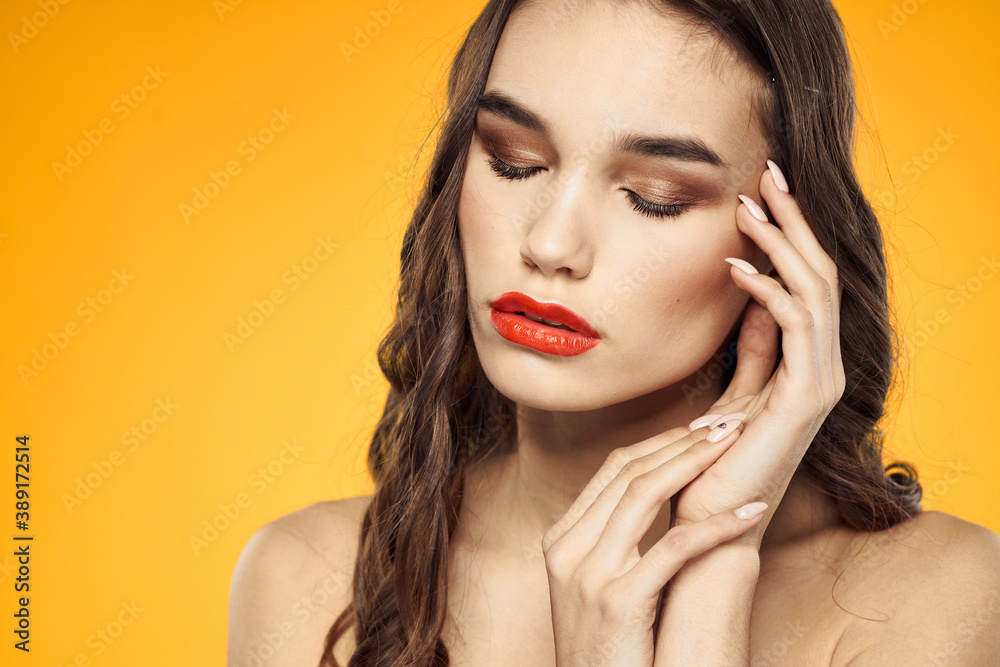 beautiful brunette red lips bare shoulders skin care yellow background beautiful brunette red lips bare shoulders skin care yellow background