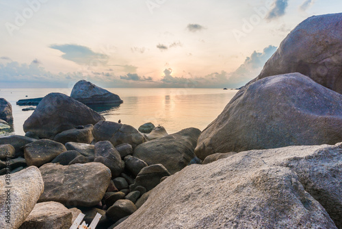 Rocky sea beach morning sunrise turquoise water