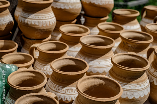 unburned clay vessels on table