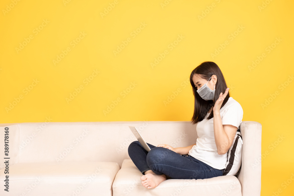 Young asian woman wearing face mask under the outbreak Young asian woman wearing face mask under the outbreak