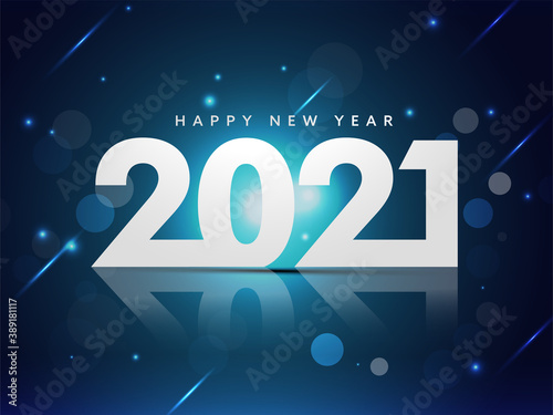 2021 Happy New Year Text With Lights Effect On Blue Background.