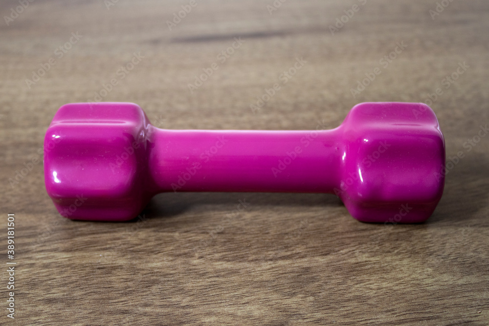 1 kilogram dumbbell in purple color. 1 kilogram dumbbell in purple color.