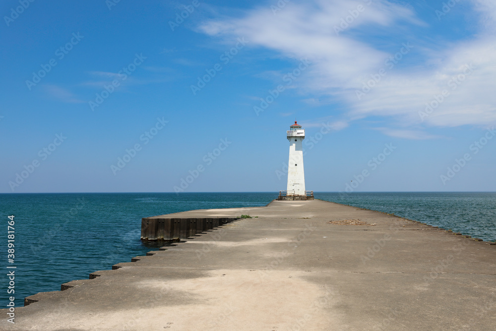 Sodus Point Lighthouse. Lighthouse in Sodus, New York. Sunny day on lake Ontario.