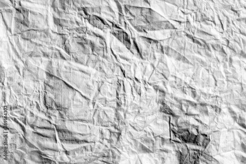 Crumpled white paper as an abstract background. Crumpled white paper as an abstract background.