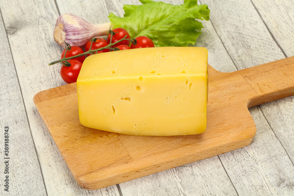 Hard yellow tasty cheese brick Hard yellow tasty cheese brick