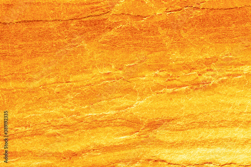 Gold stone texture for background.
