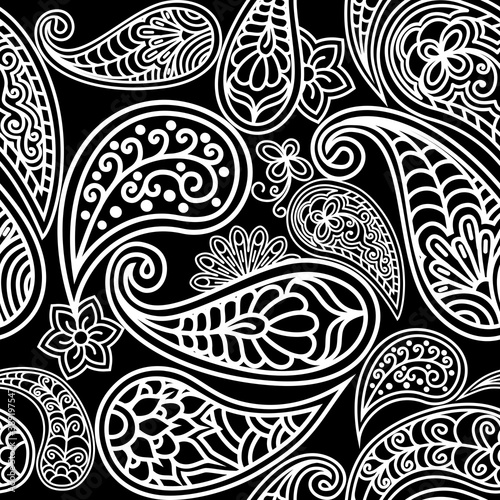 Seamless pattern of Paisley ornament. Elegant black and white monochrome background. Textile bohemian print. Batik painting. Vintage Hand Drawn ornament. © Iricat