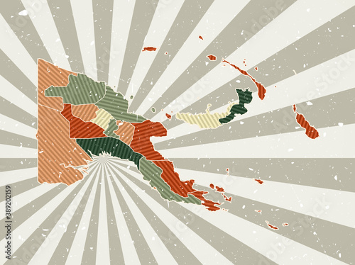Papua New Guinea vintage map. Grunge poster with map of the country in retro color palette. Shape of Papua New Guinea with sunburst rays background. Vector illustration.