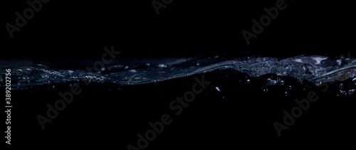 Wave of water on a black background