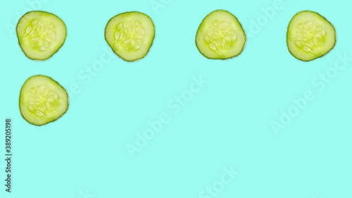 4K 60FPS Cucumber Slice on the Blue Background - Pop Up Animation