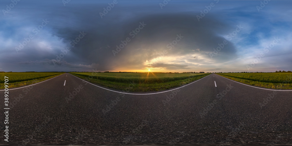 full seamless spherical hdri panorama 360 degrees angle view on asphalt road among farm fields in autumn evening before sunset with storm clouds in equirectangular projection, ready for VR AR content