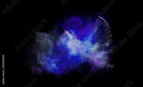 Freeze the movements of blue,  and purple color powder exploding on black background. Multicolor powder bomb.