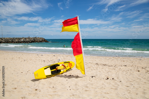 surf lifesaver ski and flag on the beach in Australia