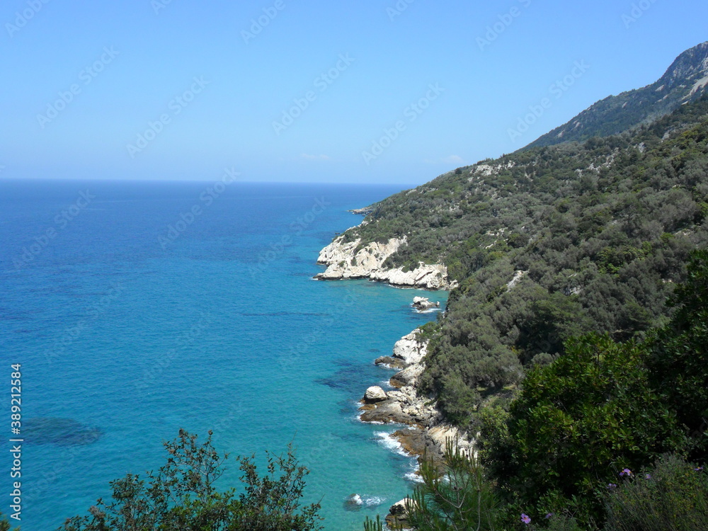 The turquoise ocean and paradise beaches of the greek island of Samos in the Aegean Sea, Greece The turquoise ocean and paradise beaches of the greek island of Samos in the Aegean Sea, Greece