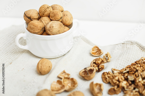 walnuts on a white wooden background