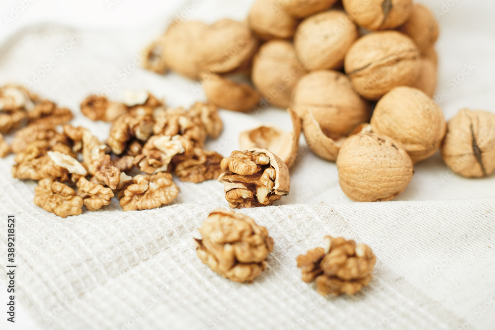 walnuts on a white wooden background