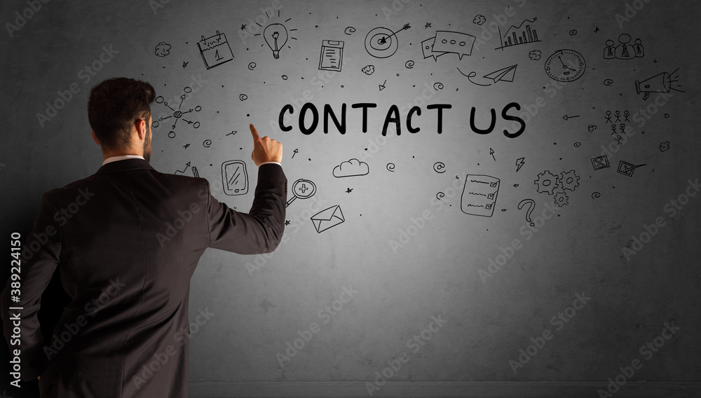 businessman drawing a creative idea sketch with CONTACT US inscription, business strategy concept businessman drawing a creative idea sketch with CONTACT US inscription, business strategy concept