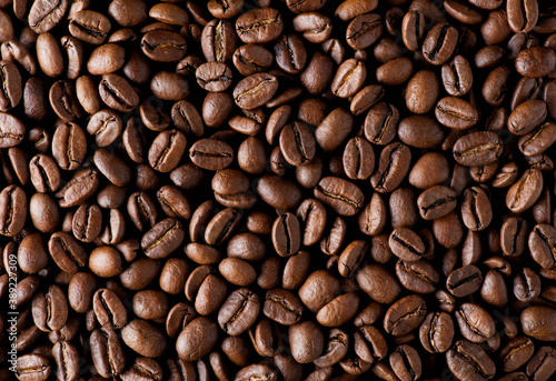 Roasted coffee beans, beautiful horizontal food background. Flat lay 