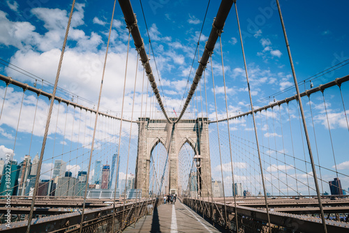 Magnificent Elegant view of New York City on the Brooklyn Bridge © ReubenTeo