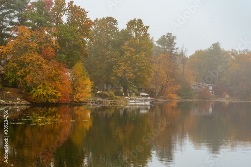 A foggy lake in the Fall in Massachusetts.